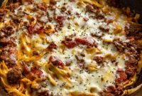 Creamy Sour Cream Noodle Casserole with Cheese and Herbs