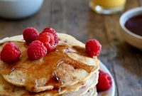 Fluffy Raspberry Oat Pancakes with Maple Glaze