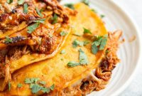 Slow-Cooked Chicken Birria Tacos with Spicy Dipping Consommé