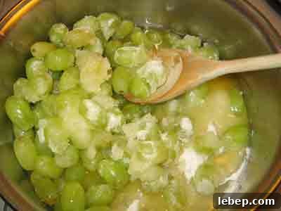 Greek Grape Spoon Sweet (Stafili Glyko) — Traditional Recipe 3 Stir ingredients for Greek spoon sweet recipe stafyli gliko.