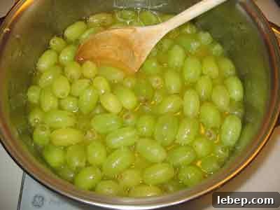 Greek Grape Spoon Sweet (Stafili Glyko) — Traditional Recipe 4 Heating grapes for Greek spoon sweet recipe stafyli gliko.