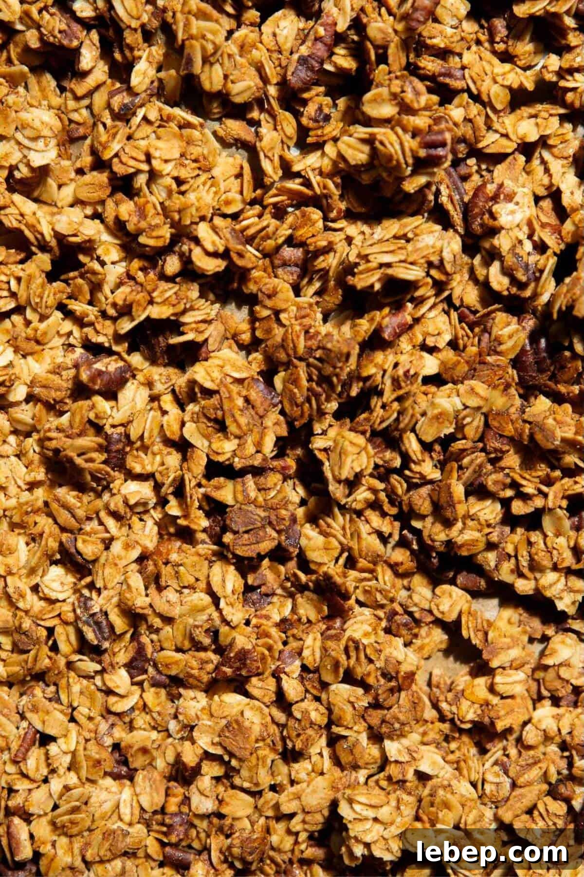 Chunky homemade healthy granola, naturally sweetened with maple syrup and refined sugar-free.