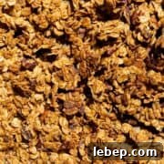Chunky homemade healthy granola, naturally sweetened with maple syrup and refined sugar-free.