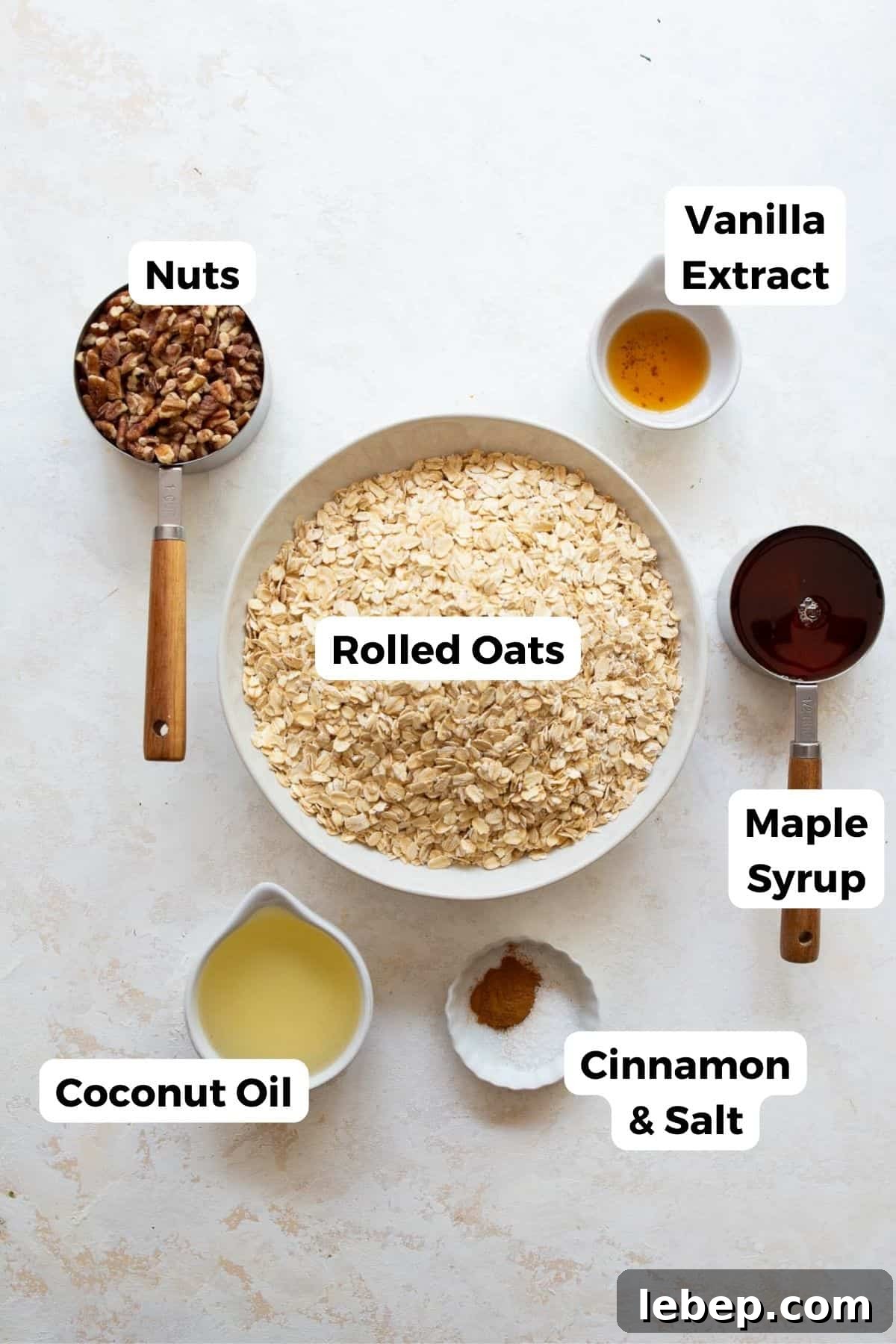 all ingredients in healthy granola in small bowls with labels