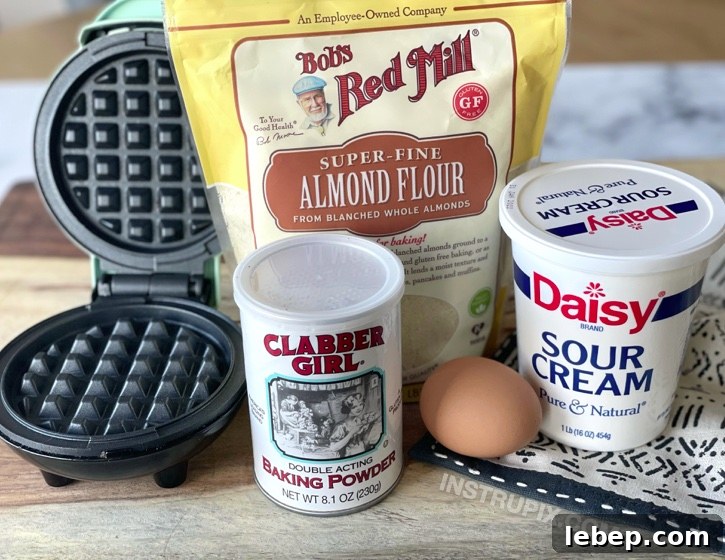 Keto Chaffle Sandwich Bread Without Cheese — Low-Carb Recipe 2 Almond Flour Keto Chaffles Without Cheese | A less greasy chaffle! This is my favorite keto chaffle recipe for sandwiches and burgers. Made with just almond flour, sour cream, egg, and baking powder in your mini waffle maker.
