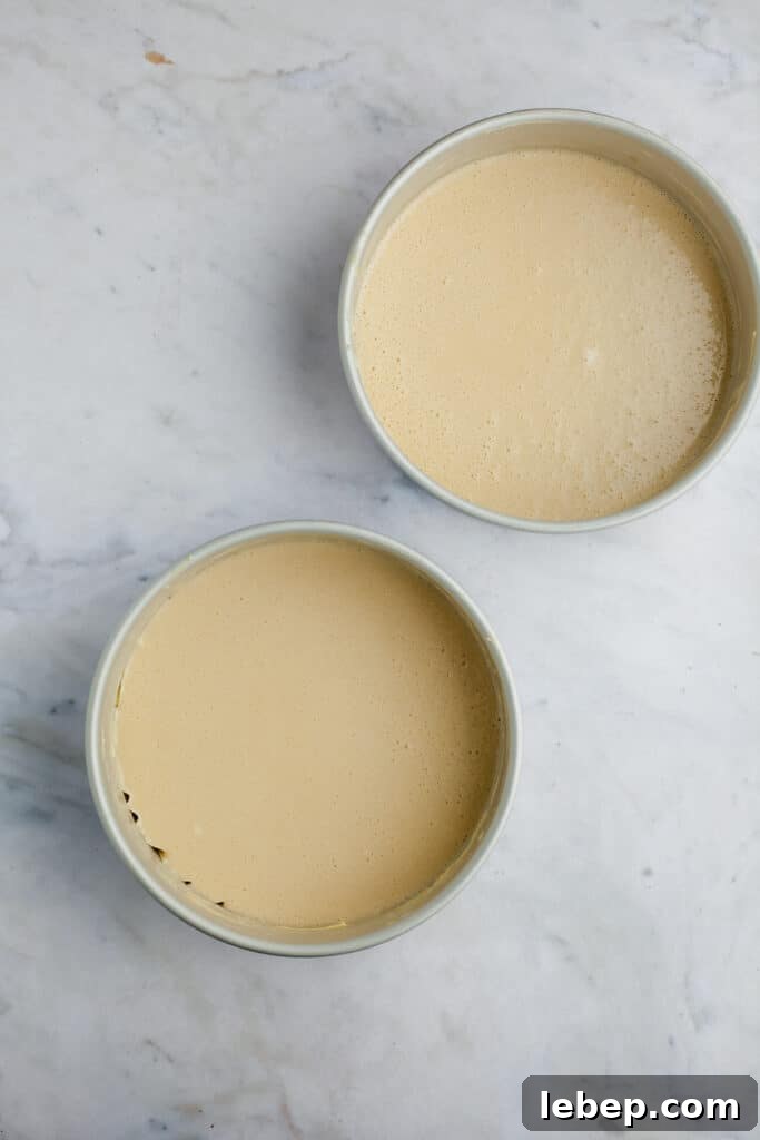 Decadent Tiramisu Layer Cake Recipe for Coffee Lovers 10 two cake pans with unbaked cake batter
