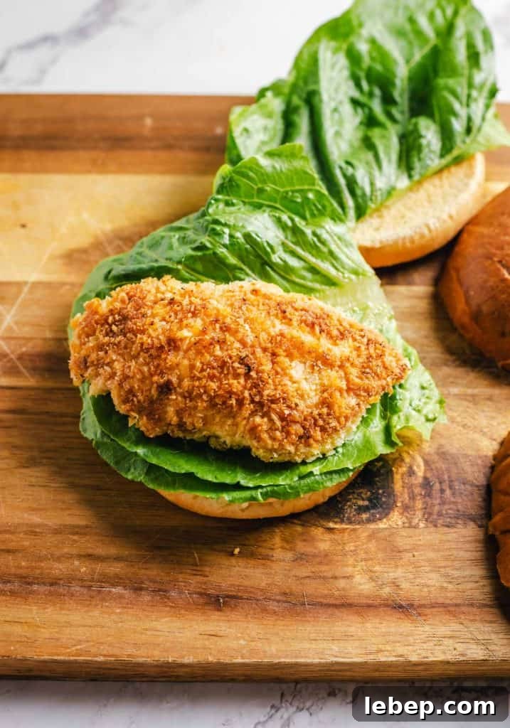 Crispy Fried Chicken Sandwich Recipe with Tangy Slaw 13 Crispy chicken breasts added to the sandwich.