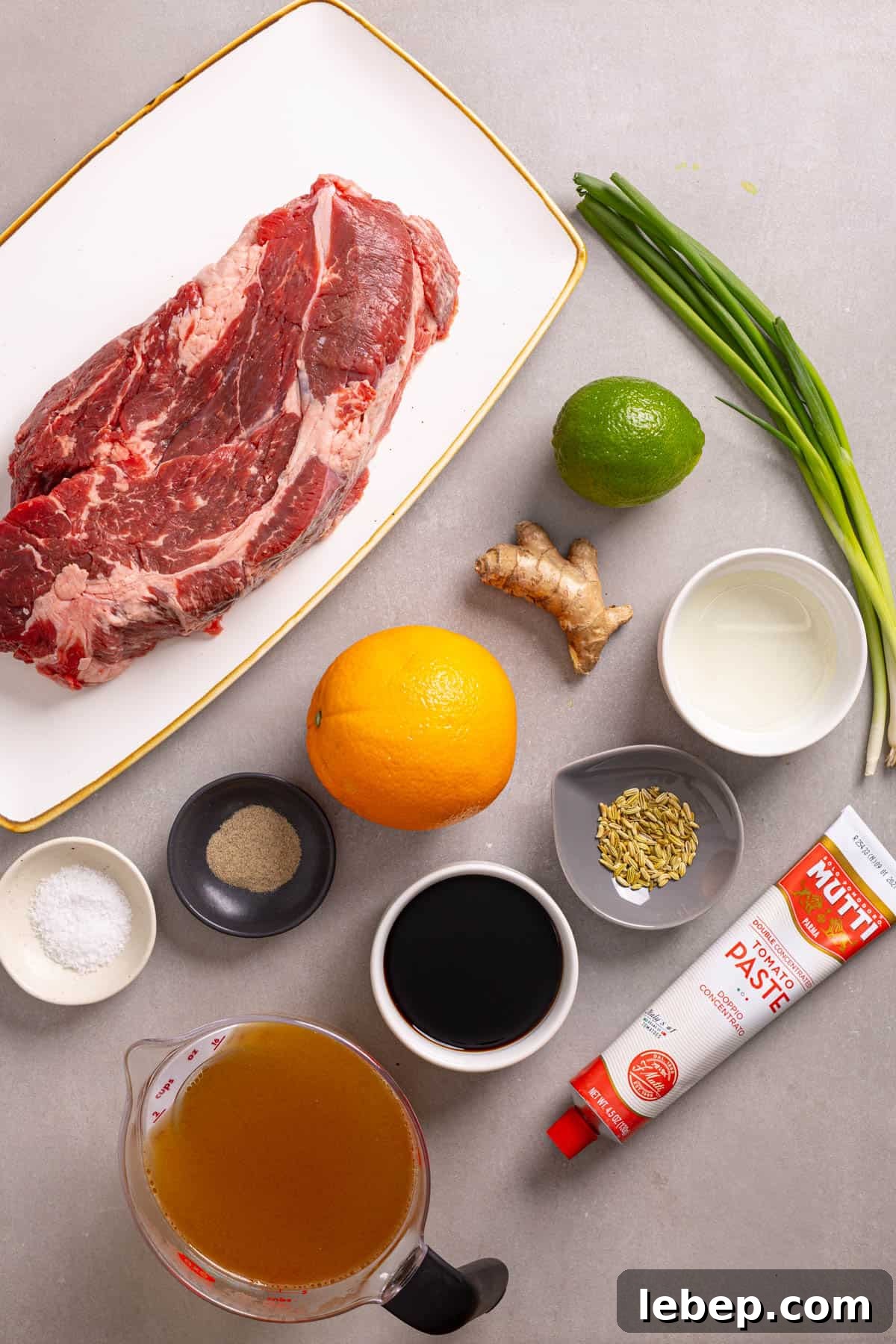 Citrus-Soy Braised Chuck Roast Recipe: Tender, Flavorful Pot Roast 3 Ingredients for braised chuck roast on a grey table.