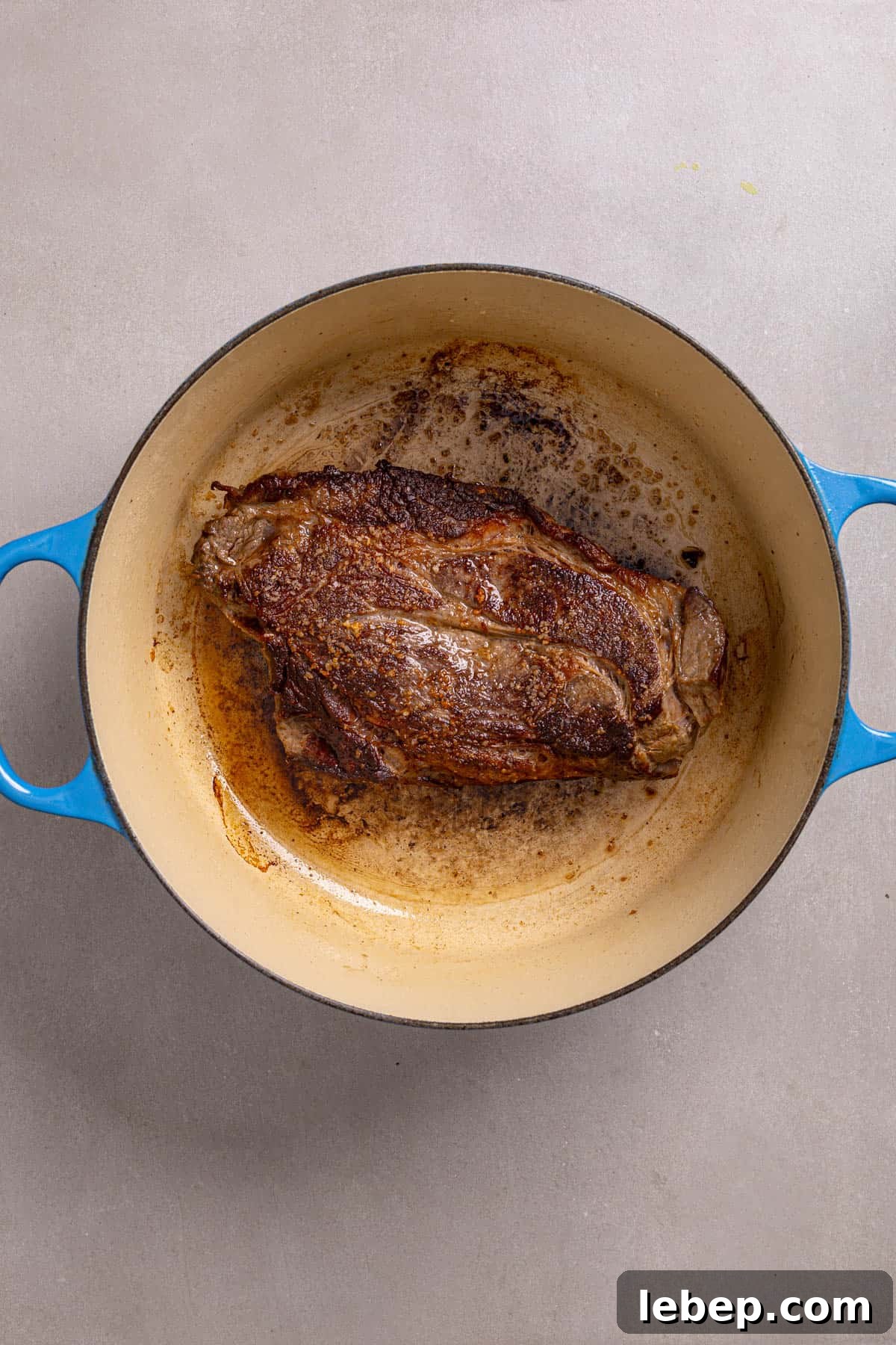 Citrus-Soy Braised Chuck Roast Recipe: Tender, Flavorful Pot Roast 4 A dutch oven with a chuck roast well browned.