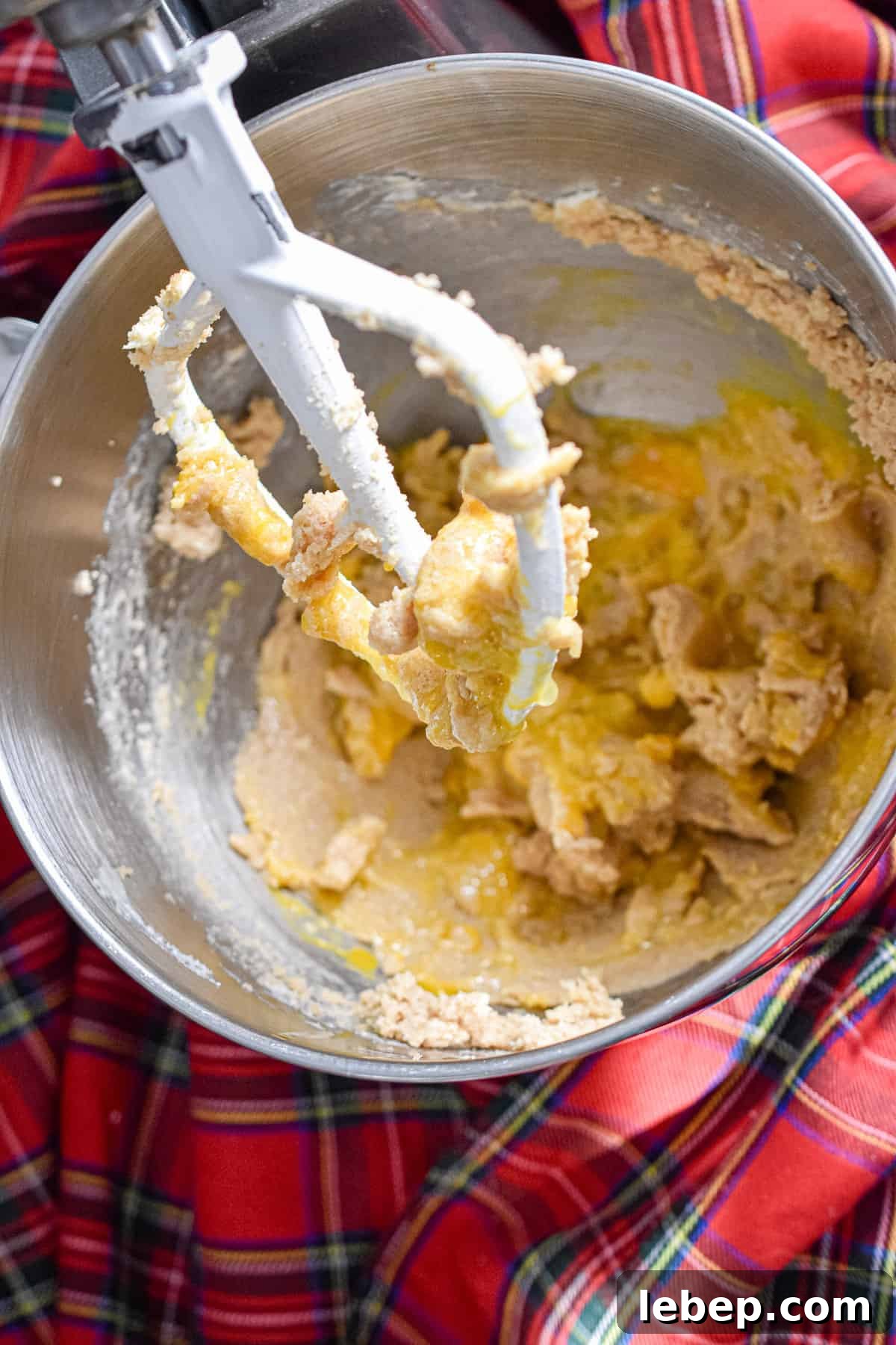 Chewy Coconut Pecan Cookies Recipe — Crispy Edges & Gooey Center 5 The eggs and vanilla are added to the dough.