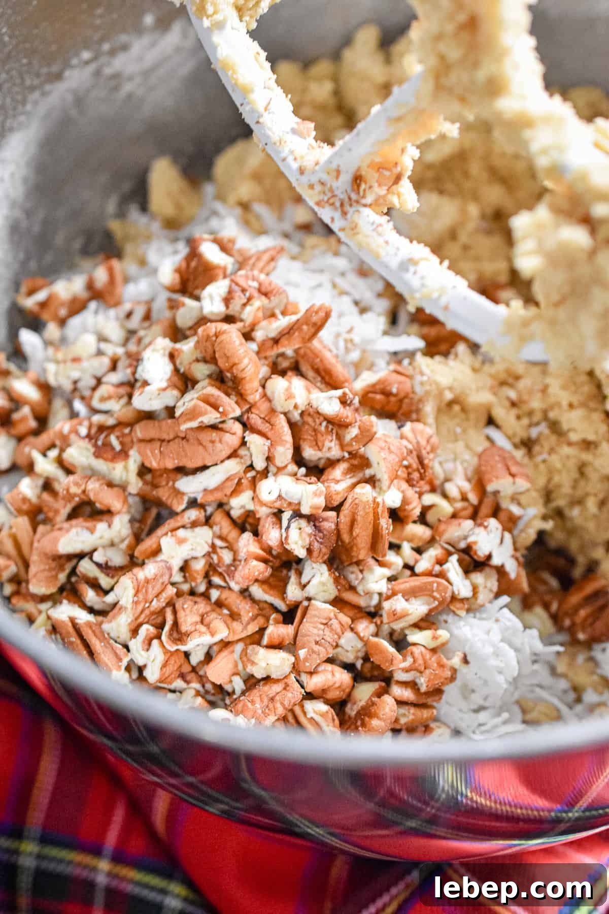 Chewy Coconut Pecan Cookies Recipe — Crispy Edges & Gooey Center 7 The coconut and pecans are added to the dough ball.
