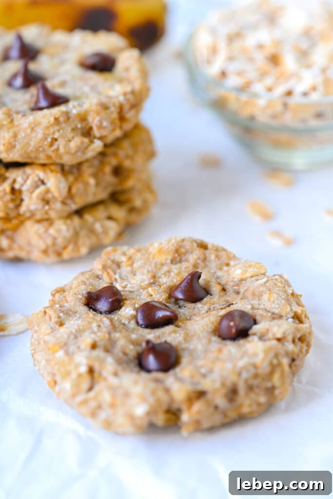Banana Oatmeal Cookies with 2 Ingredients: Simple Homemade Recipe 3 tower of healthy banana oat cookies with chocolate chips