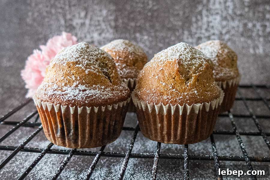 Baking Powder vs Baking Soda: When to Use Each in Recipes 3 gluten free muffins on a cooling rack