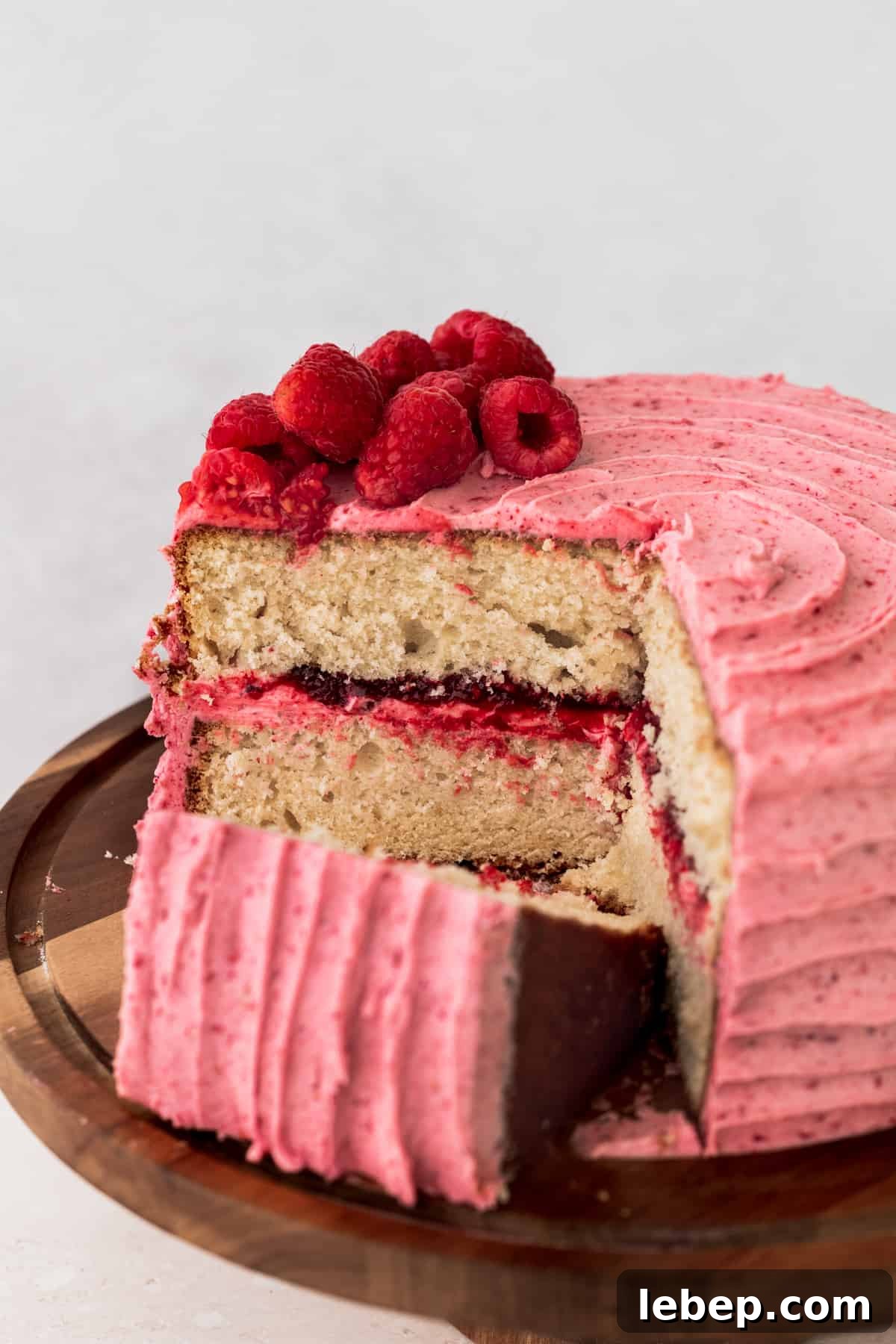 Sliced in vanilla raspberry cake..