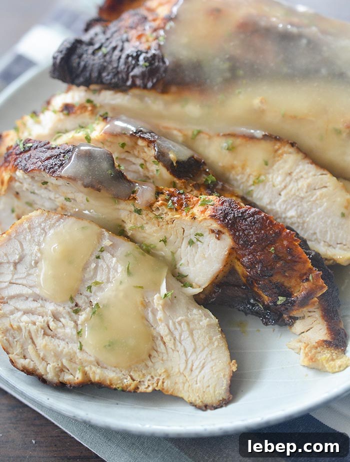 How to Roast a 7‑Pound Turkey Breast in a Ninja Foodi Air Fryer 4 Seasoned air fryer turkey breast topped with gravy.