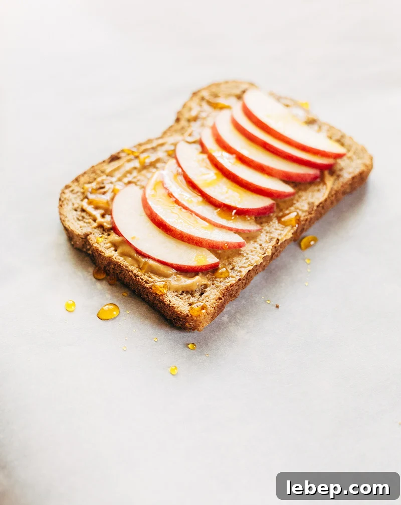 Apple & Honey Peanut Butter Toast Recipe — Quick Morning Snack 5 Peanut Butter Toast with Apples and Honey up close