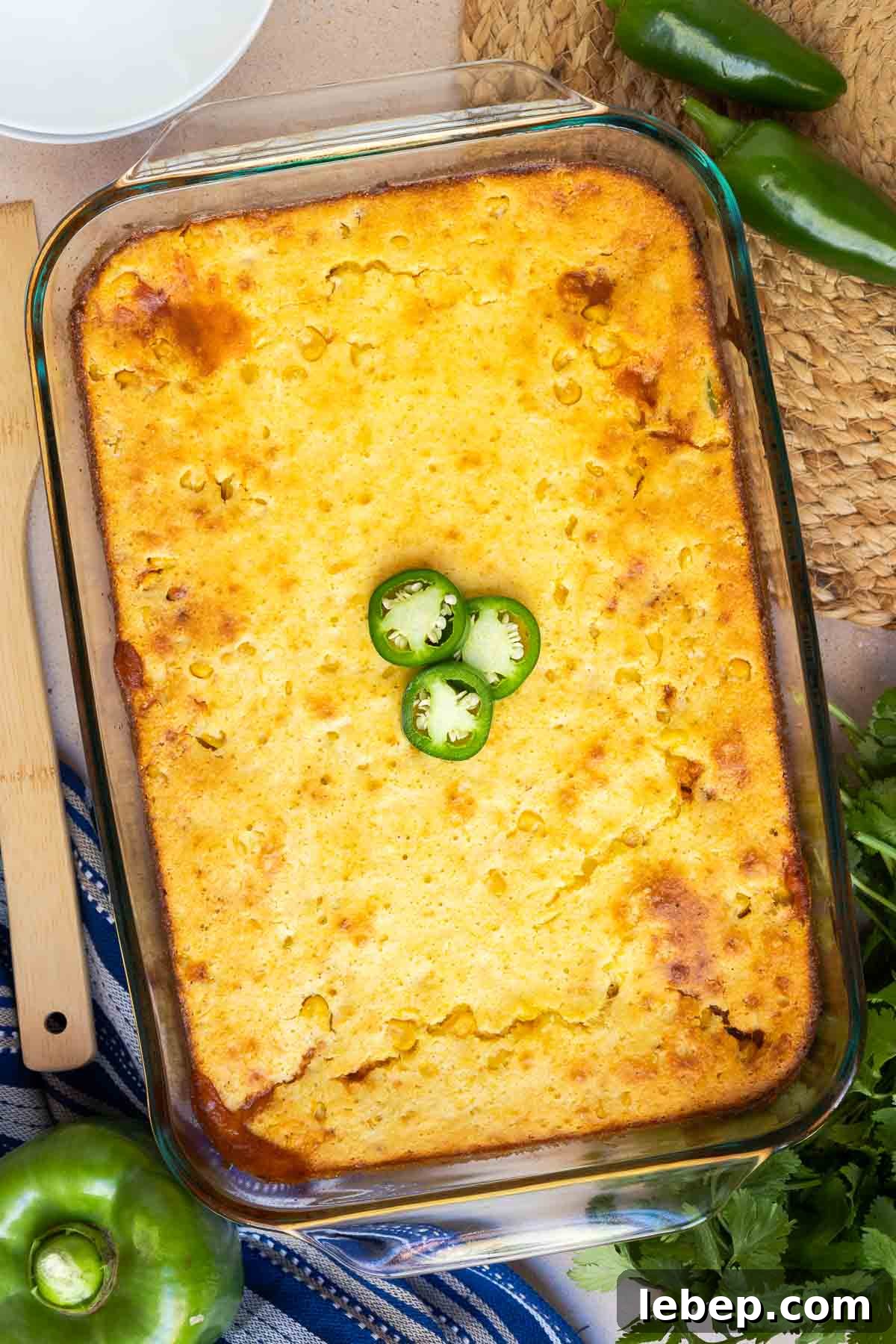 Canned Chili Cornbread Casserole Recipe for Quick Weeknight Dinner 3 Chili cornbread casserole baked until golden brown and topped with fresh jalapeño.
