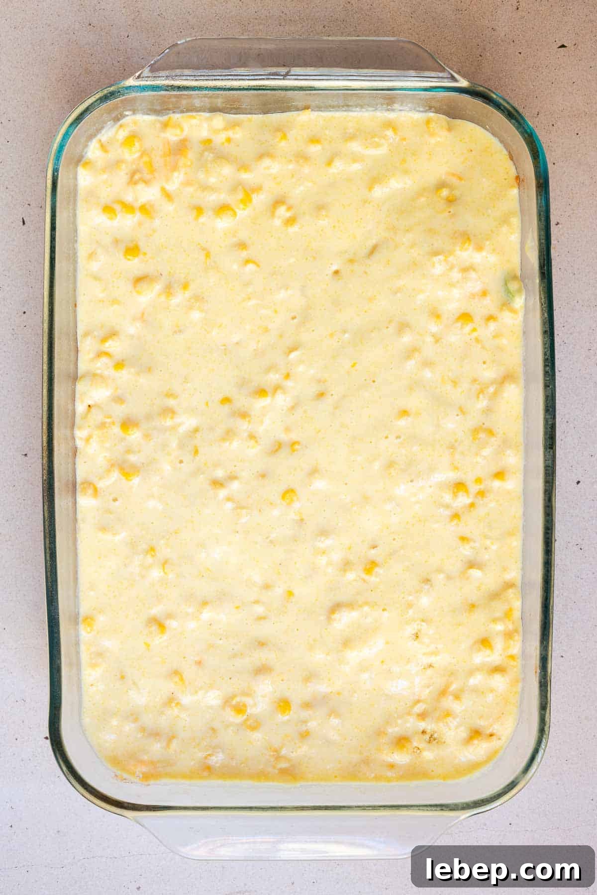 Canned Chili Cornbread Casserole Recipe for Quick Weeknight Dinner 8 The cornbread mixture is pour in an even layer over top of the chili.