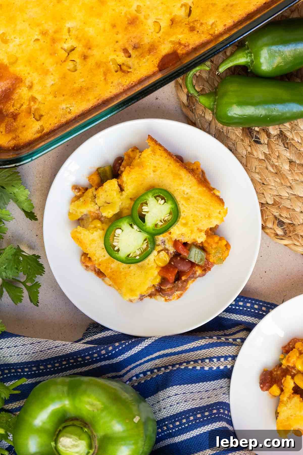 Canned Chili Cornbread Casserole Recipe for Quick Weeknight Dinner 10 Chili cornbread casserole topped with fresh jalapeño.
