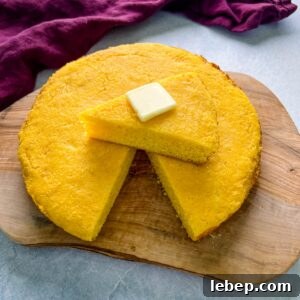 Soul food Southern homemade cornbread sliced with butter