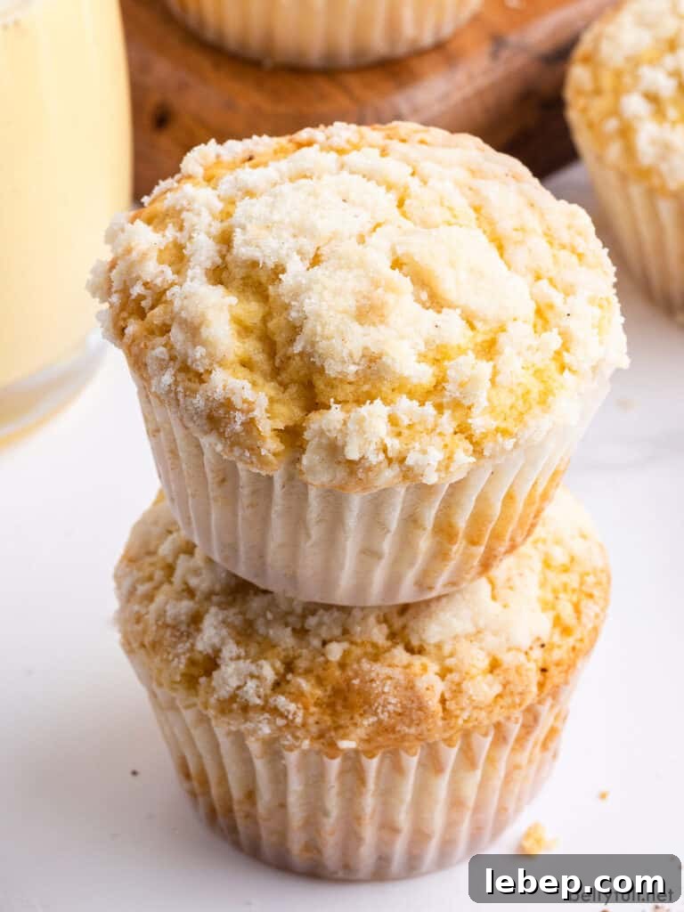 2 eggnog muffins stacked on top of each other