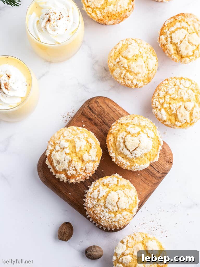 overhead picture of 8 muffins and 2 glasses of eggnog