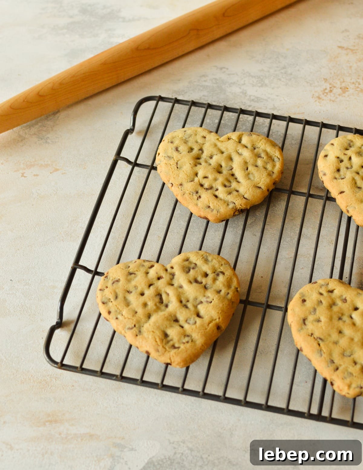 Heart-Shaped Chocolate Chip Cookies Recipe for Valentine Treats 10 heart cookies on a cooling rack