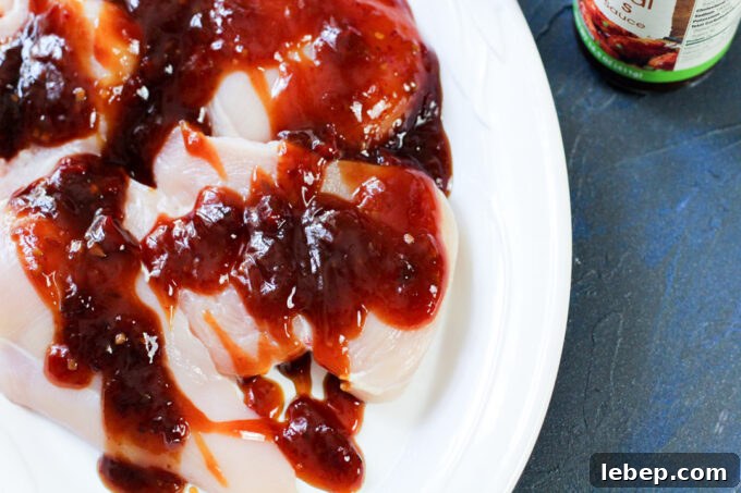 General Tso Grilled Chicken Rice Bowls — Sweet-Spicy Asian Flavor 4 raw chicken thighs coated in Asian sauce.
