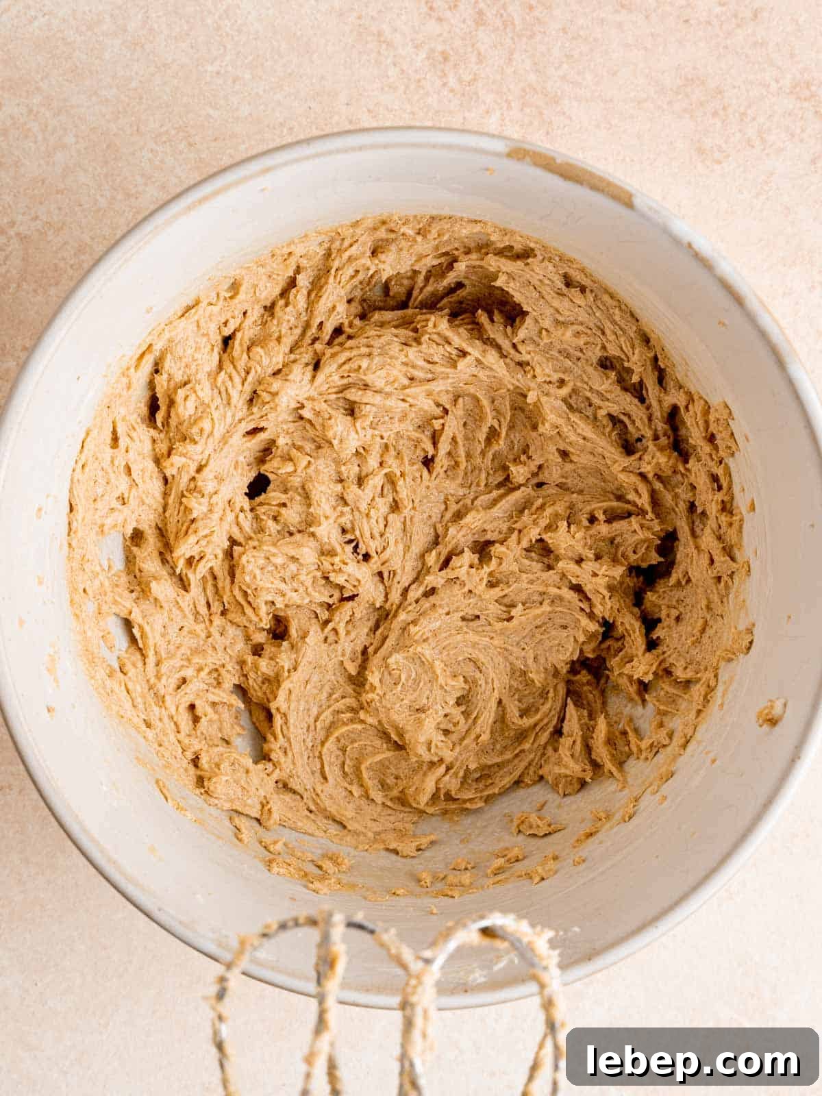 Chewy Malted Milk Chocolate Chip Cookie Recipe 4 Butter, brown sugar, egg, and vanilla extract mixed in a bowl.