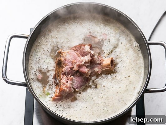 Stovetop Ham and Bean Soup Recipe — Ready in Minutes 5 Ham soup simmering