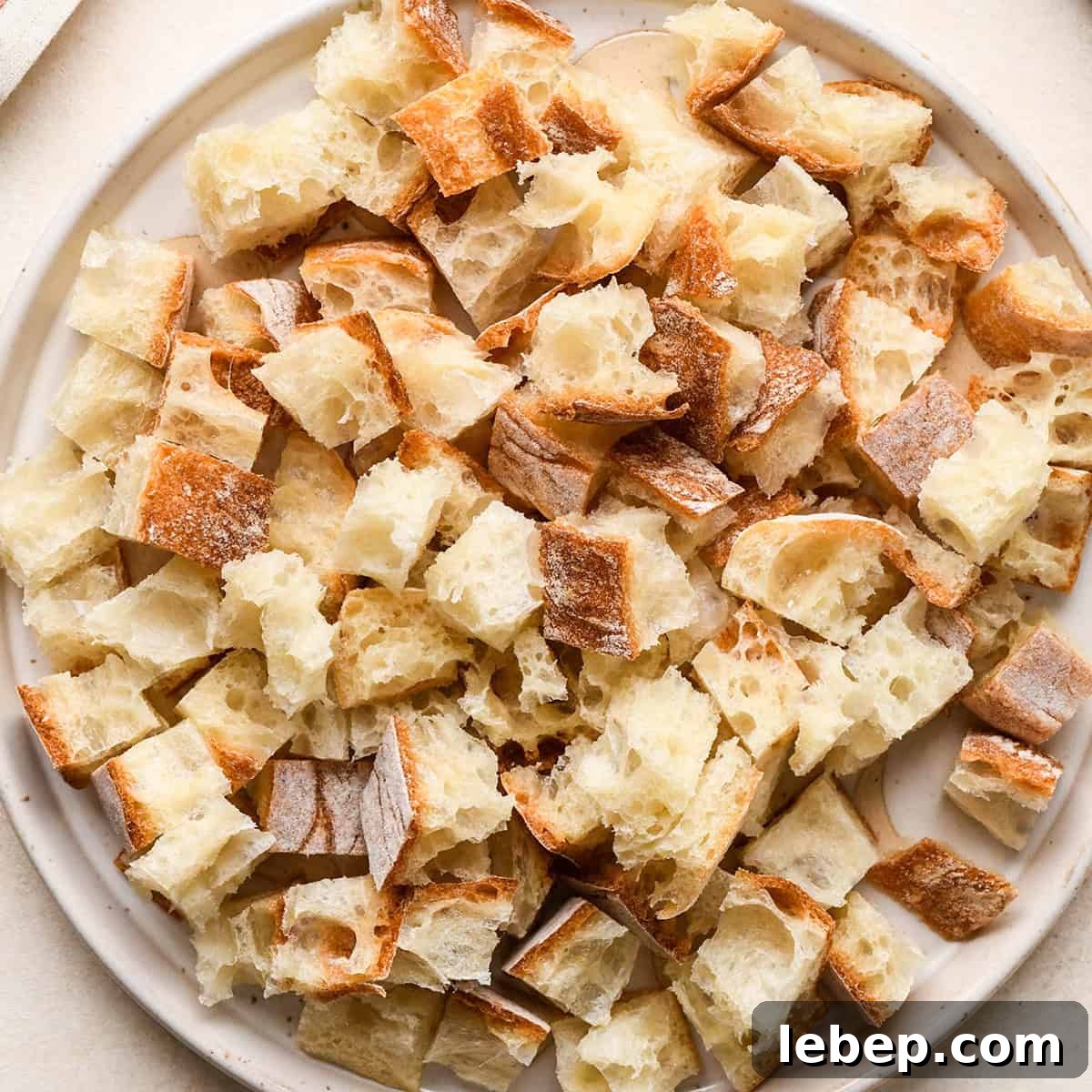 How to Make Croutons - bread cubed on a plate