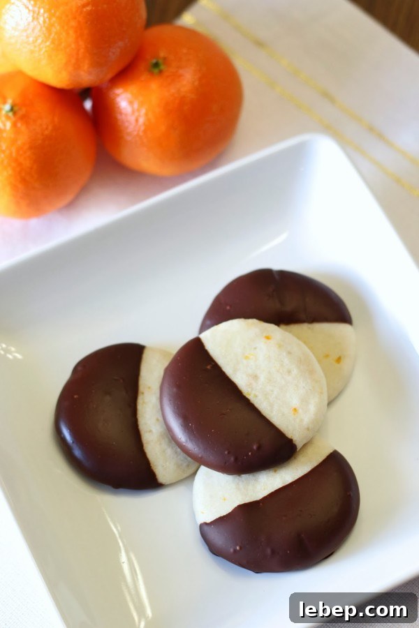 Gluten-Free Vegan Chocolate-Dipped Clementine Sugar Cookies + Cuties Giveaway 2 orange chocolate cookies1-2