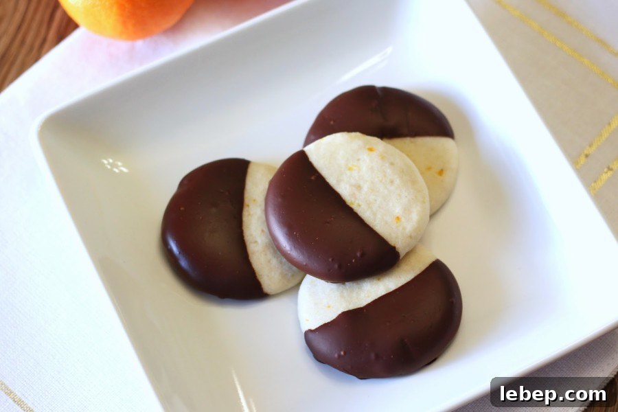 Gluten-Free Vegan Chocolate-Dipped Clementine Sugar Cookies + Cuties Giveaway 4 orange chocolate cookies2