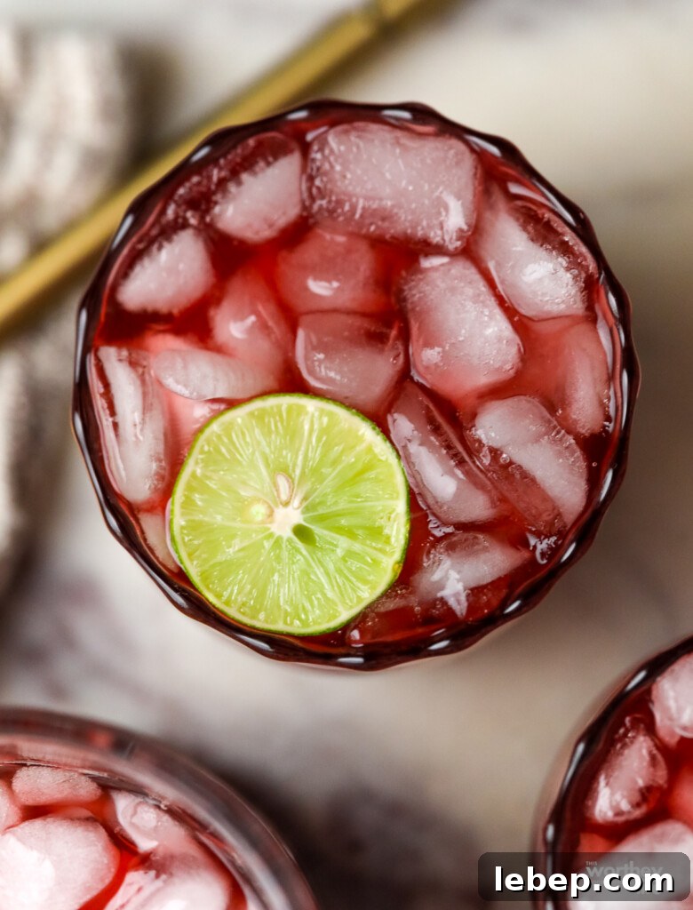 Sleepy Girl Mocktail Recipe: Relaxing Alcohol-Free Cocktail 5 a glass filled with a drink to help you go to sleep