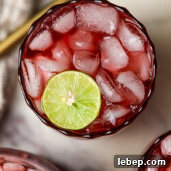 Sleepy Girl Mocktail Recipe: Relaxing Alcohol-Free Cocktail 6 a glass filled with a drink to help you go to sleep