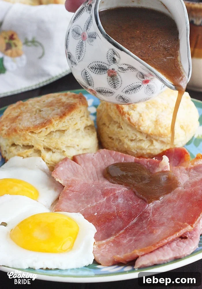 Southern Country Ham with Classic Red-Eye Gravy Recipe 8 pouring the red eye gravy over the country ham
