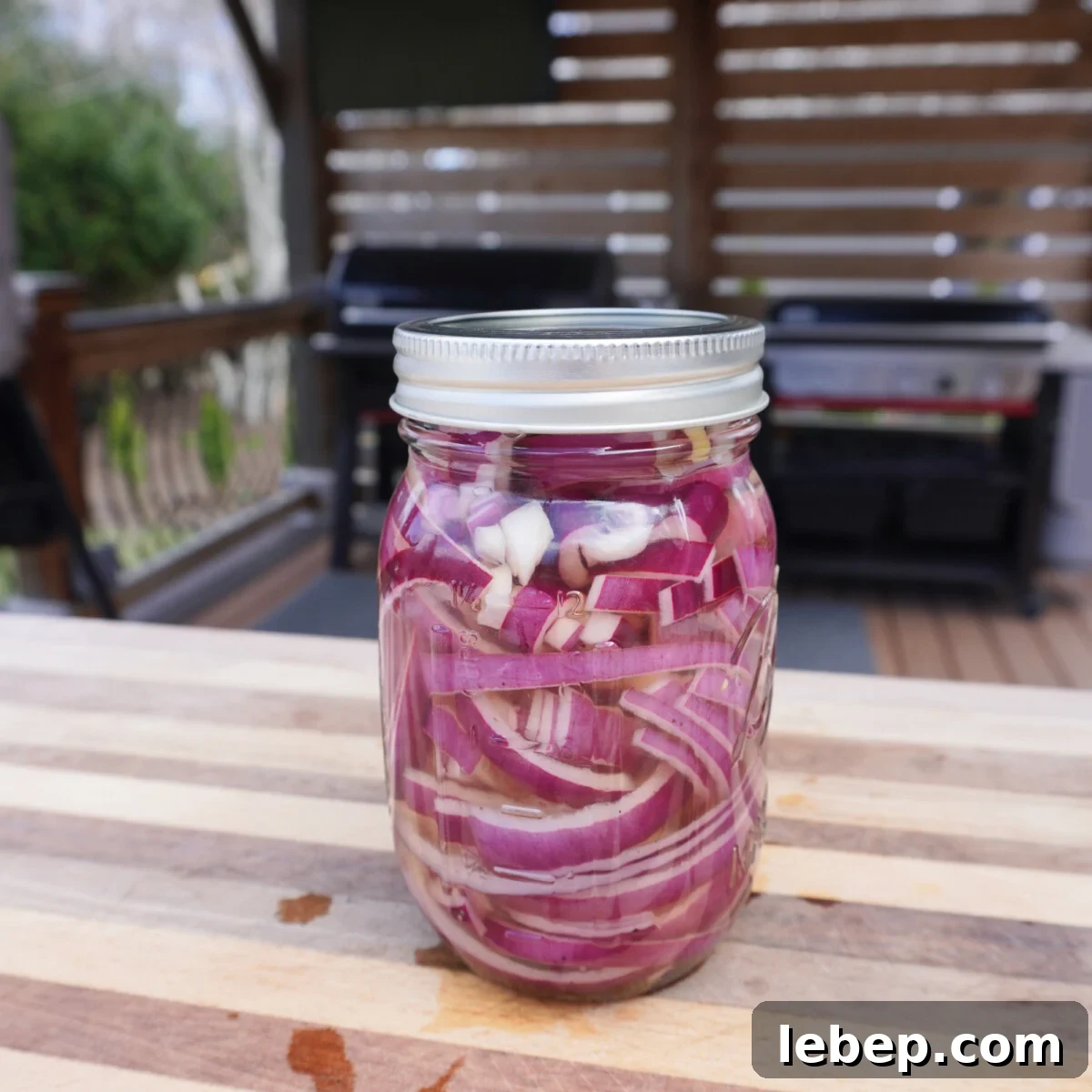 pickled red onion in a mason jar.