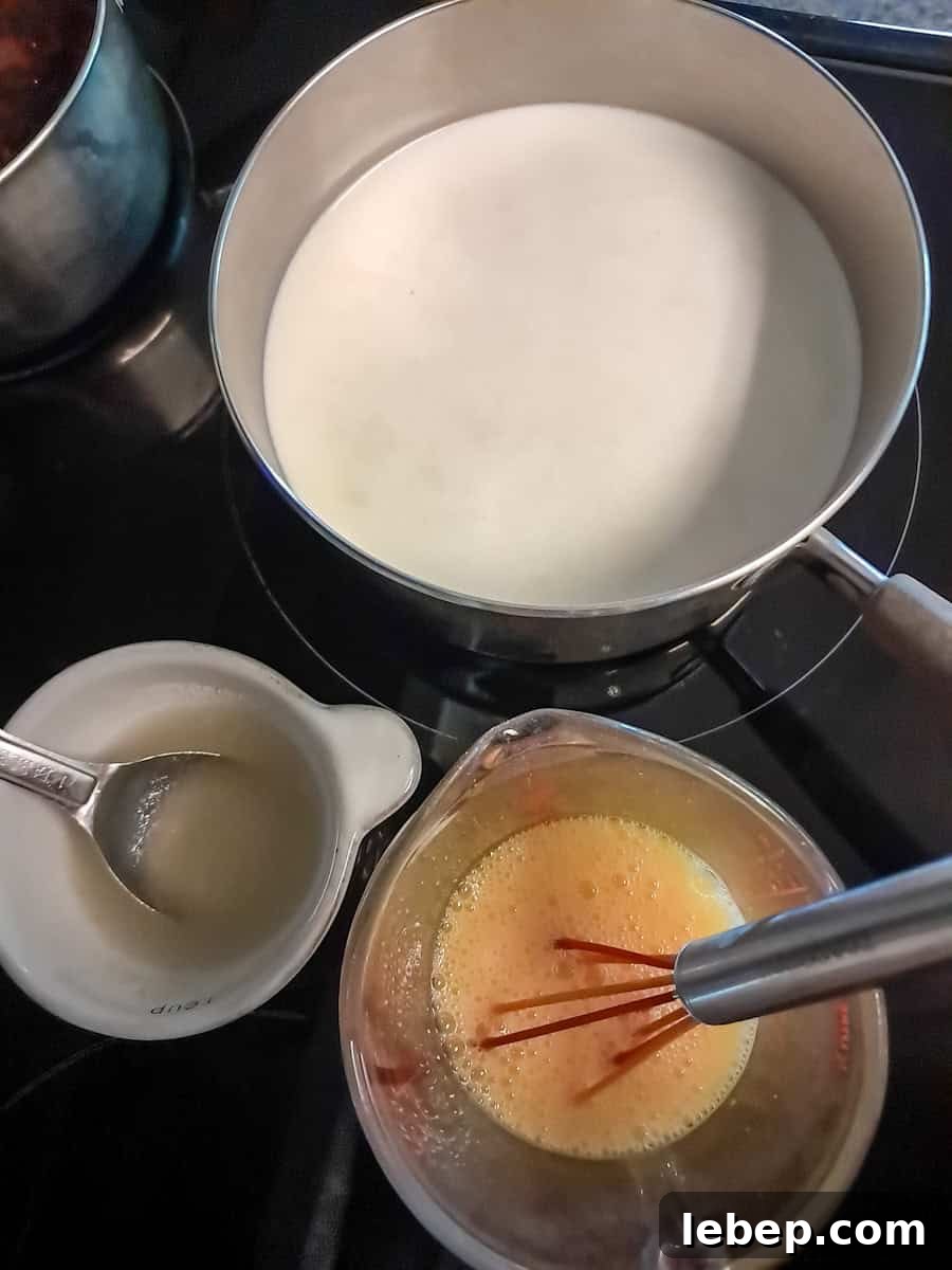Creamy Amish Blackberry Ice Cream Recipe for Summer 3 getting ready to cook the custard: milk in a saucepan, beaten eggs in a dish and gelatin mixture in a small dish.