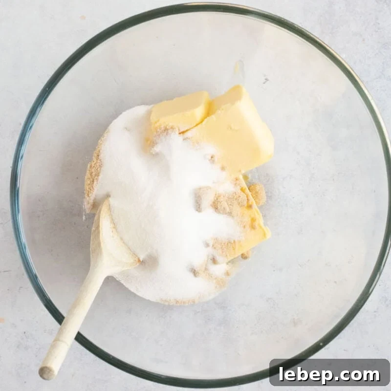 Air Fryer Banana Bread Recipe: Moist, Quick Loaf in 30 Minutes 4 Butter and sugar in a bowl.