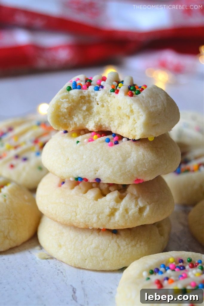 Stack of four buttery whipped shortbread cookies