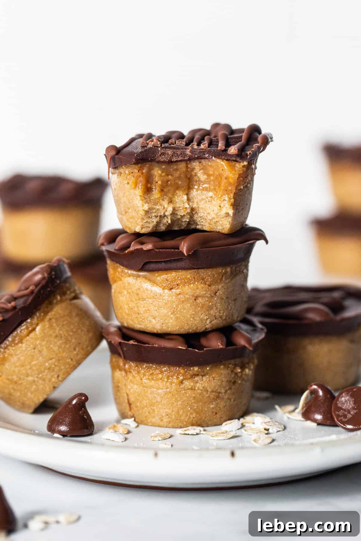 Peanut Butter Twix Cups Recipe — Homemade Candy Bars in Minutes 2 Peanut butter cups stacked on a plate.