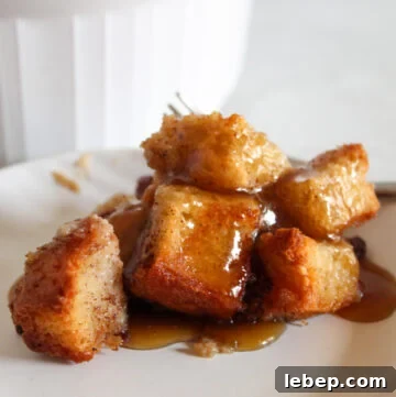 serving of gluten free bread pudding on a plate.