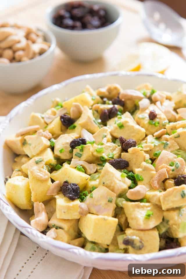 20+ Picnic and Potluck Salads That Stay Fresh and Travel Well 7 Curry Chicken Salad - In a Low White Bowl with Raisins and Chives