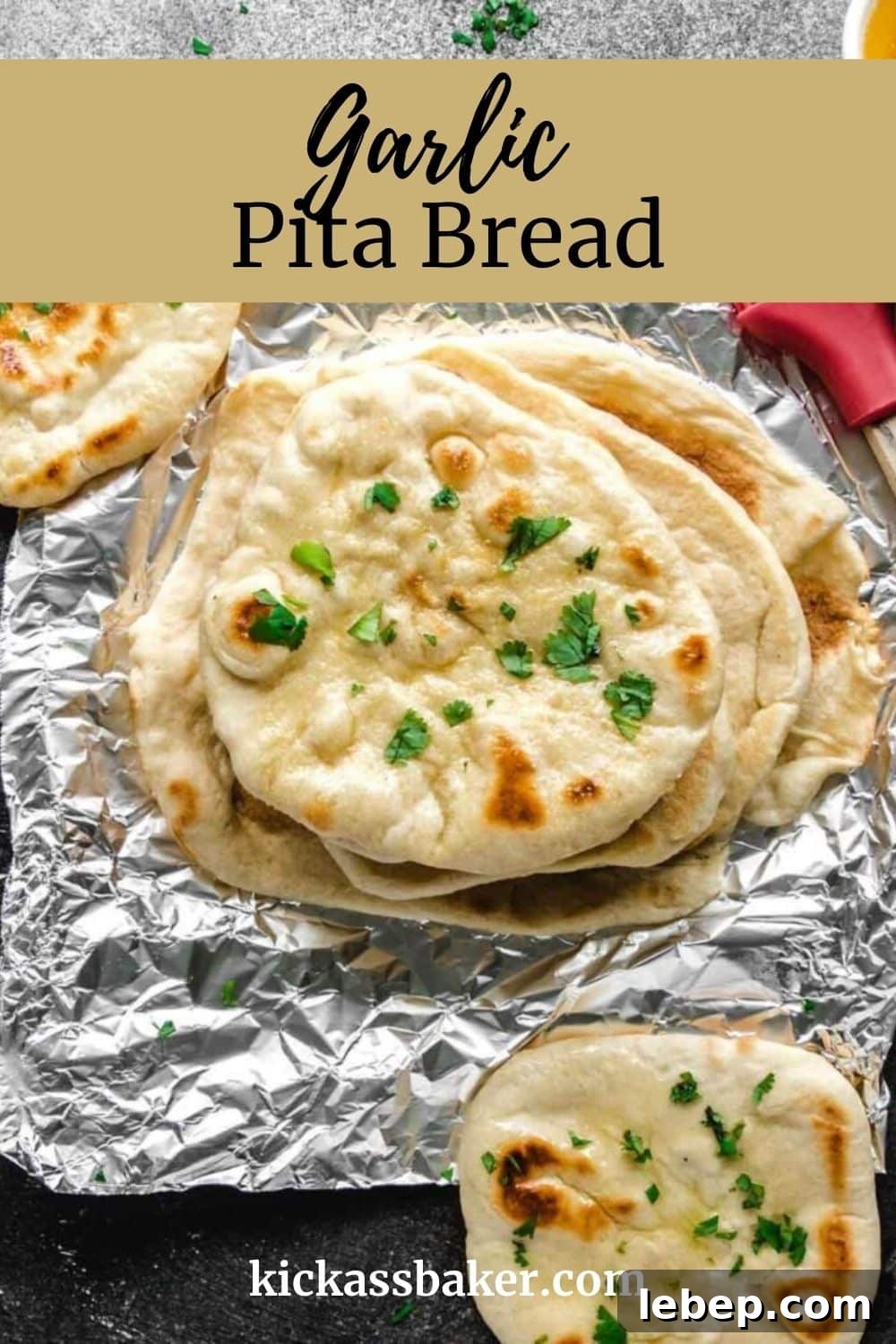 Garlic Pita Bread Recipe: Crispy, Flavorful Homemade Pitas 17 Freshly baked homemade garlic pita staying warm on foil.