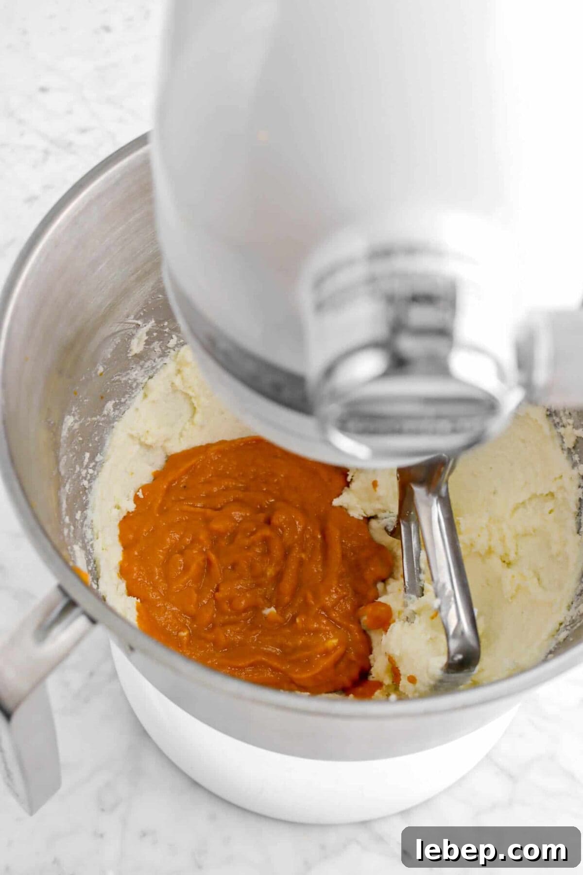 Moist Pumpkin Bread Recipe with Warm Spices 13 pumpkin mixture added to creamed butter