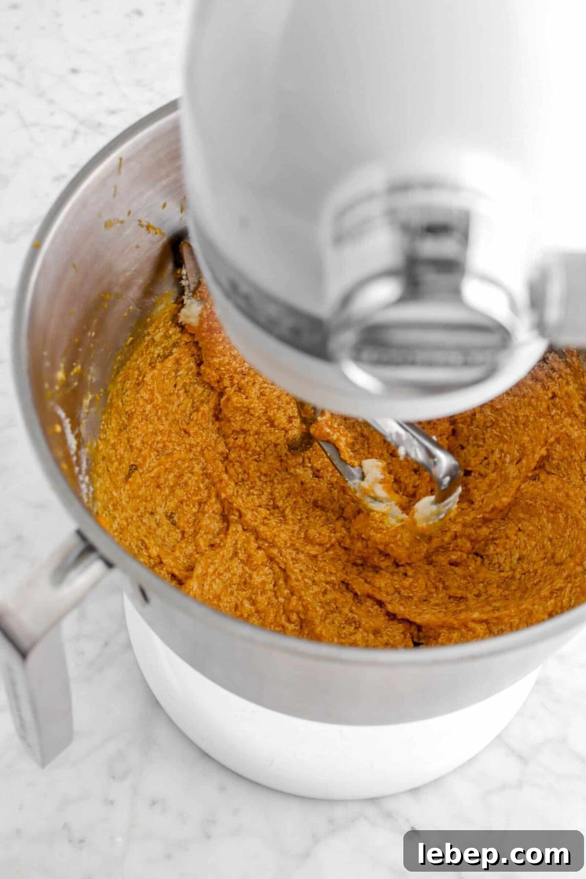 Moist Pumpkin Bread Recipe with Warm Spices 14 pumpkin mixed into butter mixture