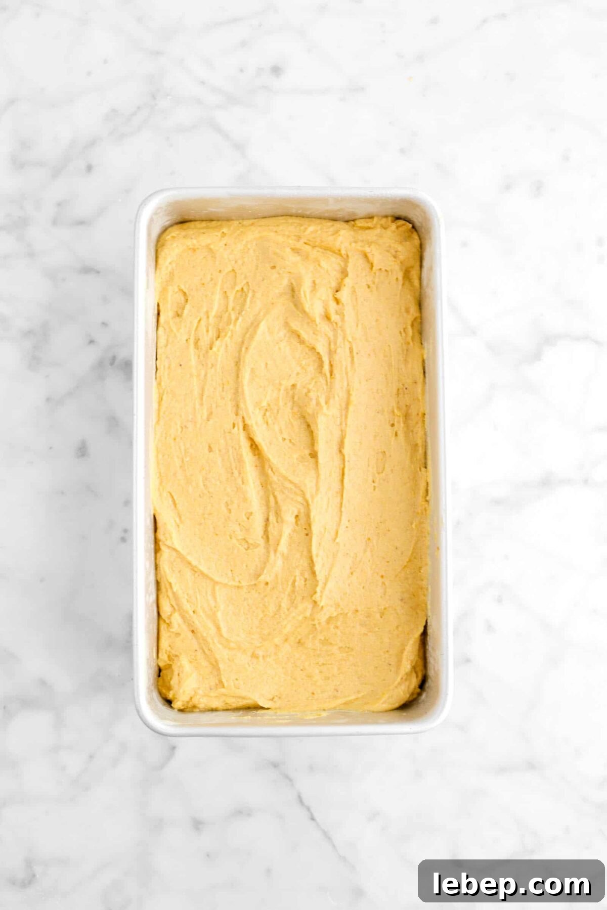 Moist Pumpkin Bread Recipe with Warm Spices 15 pumpkin batter in loaf pan