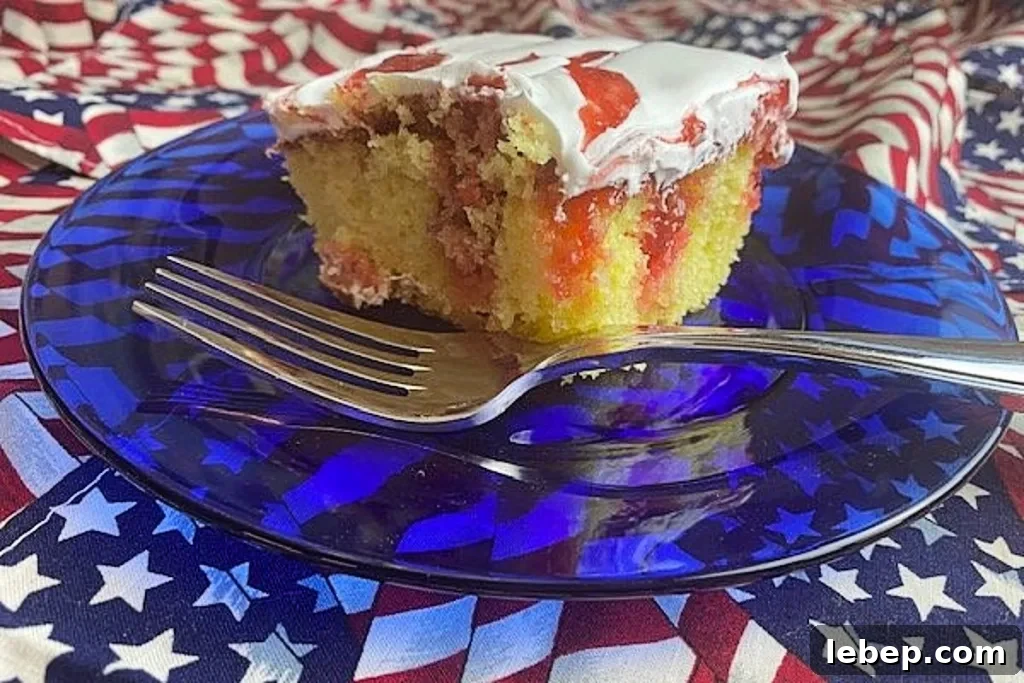 Slice of rhubarb poke cake