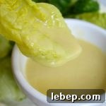 Homemade Honey Mustard Dressing on lettuce