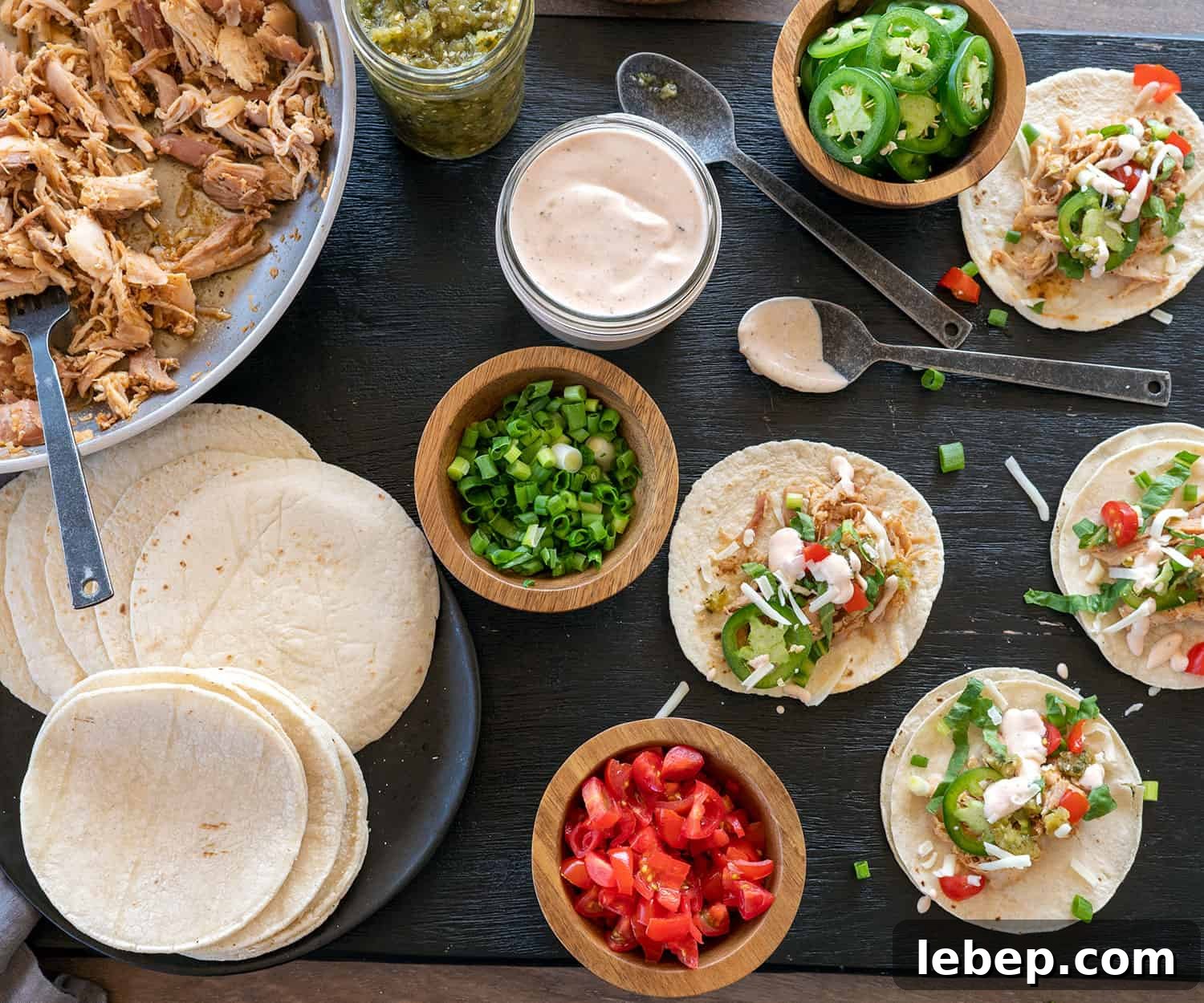 overhead view of pulled turkey tacos and fixings
